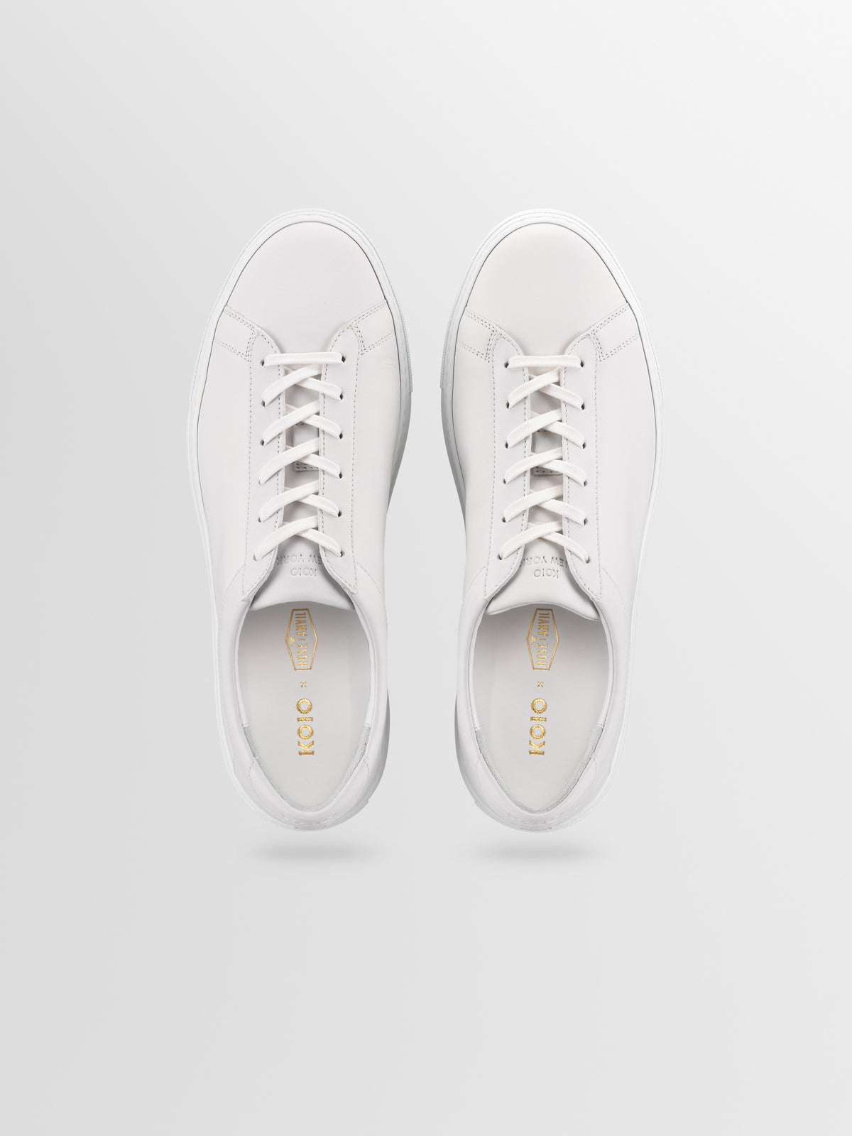 Capri Leather Sneaker in Triple White Rose Anvil