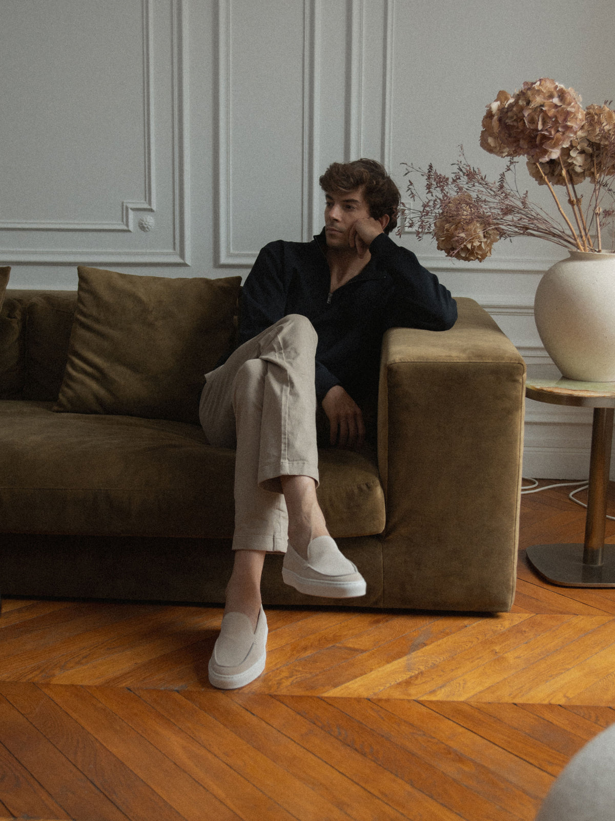 Man sitting wearing Men