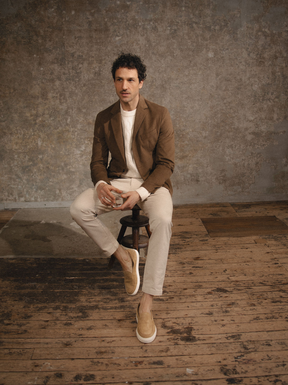 Man sitting wearing men
